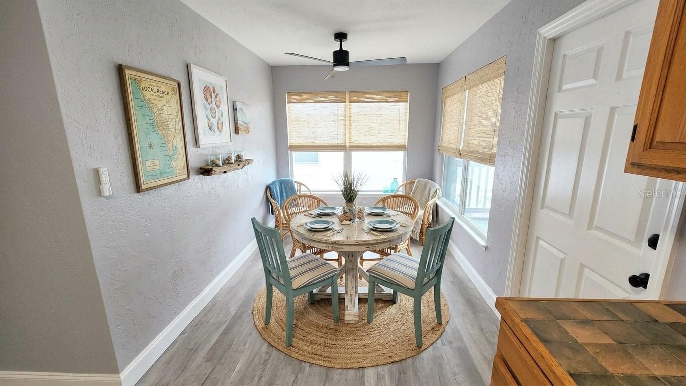 Virtually Staged Dining RM - 111 145TH AVE E #4, MADEIRA BEACH