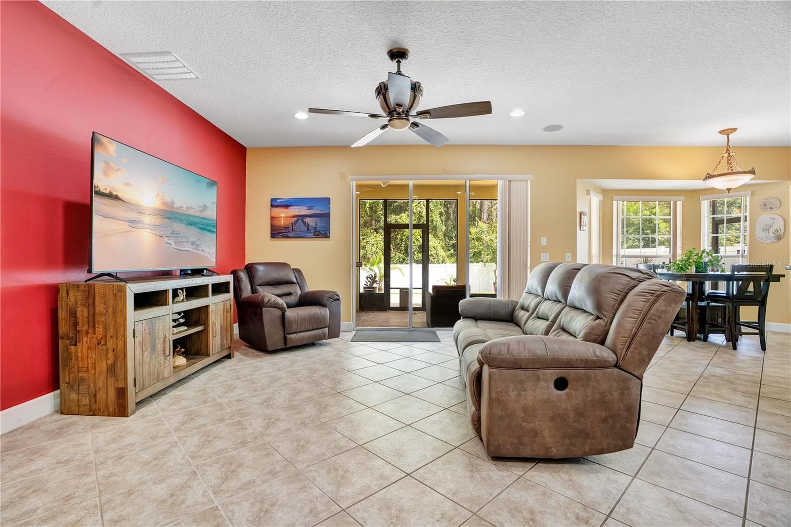 family room - 5762 COVINGTON COVE WAY, ORLANDO