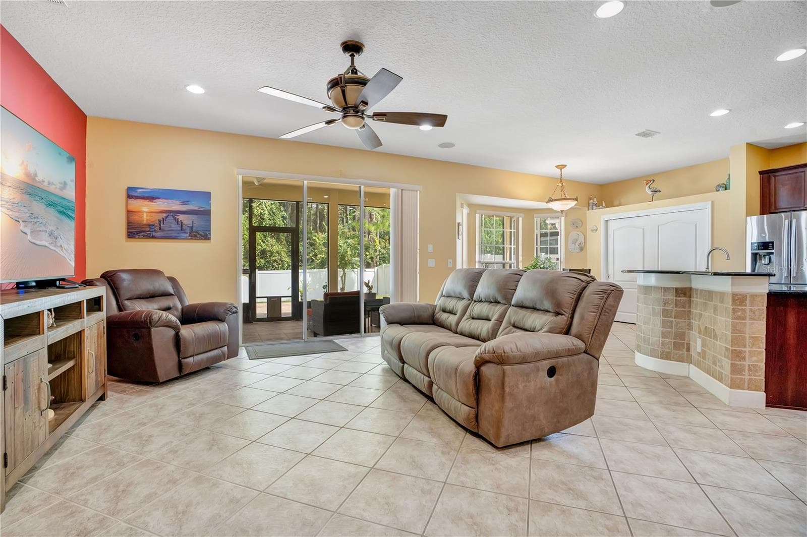 family room - 5762 COVINGTON COVE WAY, ORLANDO