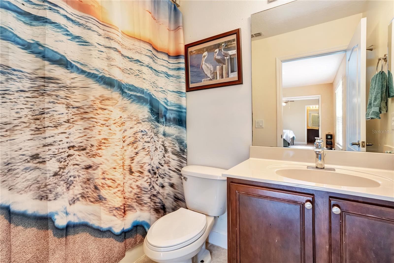 ensuite full bathroom off bedroom 2 - 5762 COVINGTON COVE WAY, ORLANDO