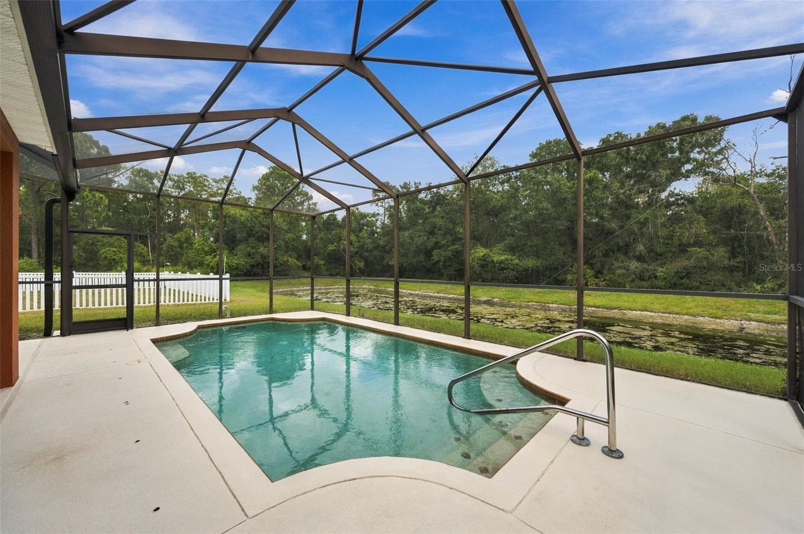 Single Family Residence at 11002 BELLE HAVEN DR, NEW PORT RICHEY, photo 3 of 100