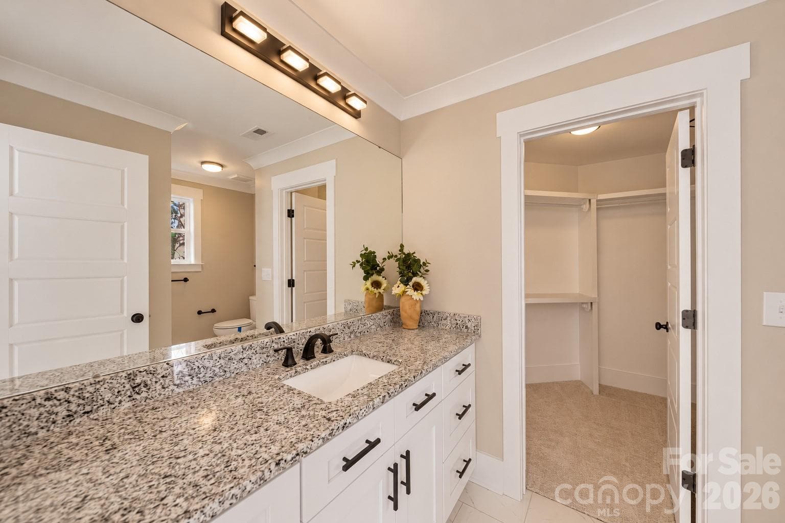Primary ensuite.Photos are from a previous build and are representative only. Actual finishes, features, and layout may vary slightly. Some photos have been virtually staged. A completed home in Charlotte is available to tour by appointment. - 1222 Wood Street, Albemarle