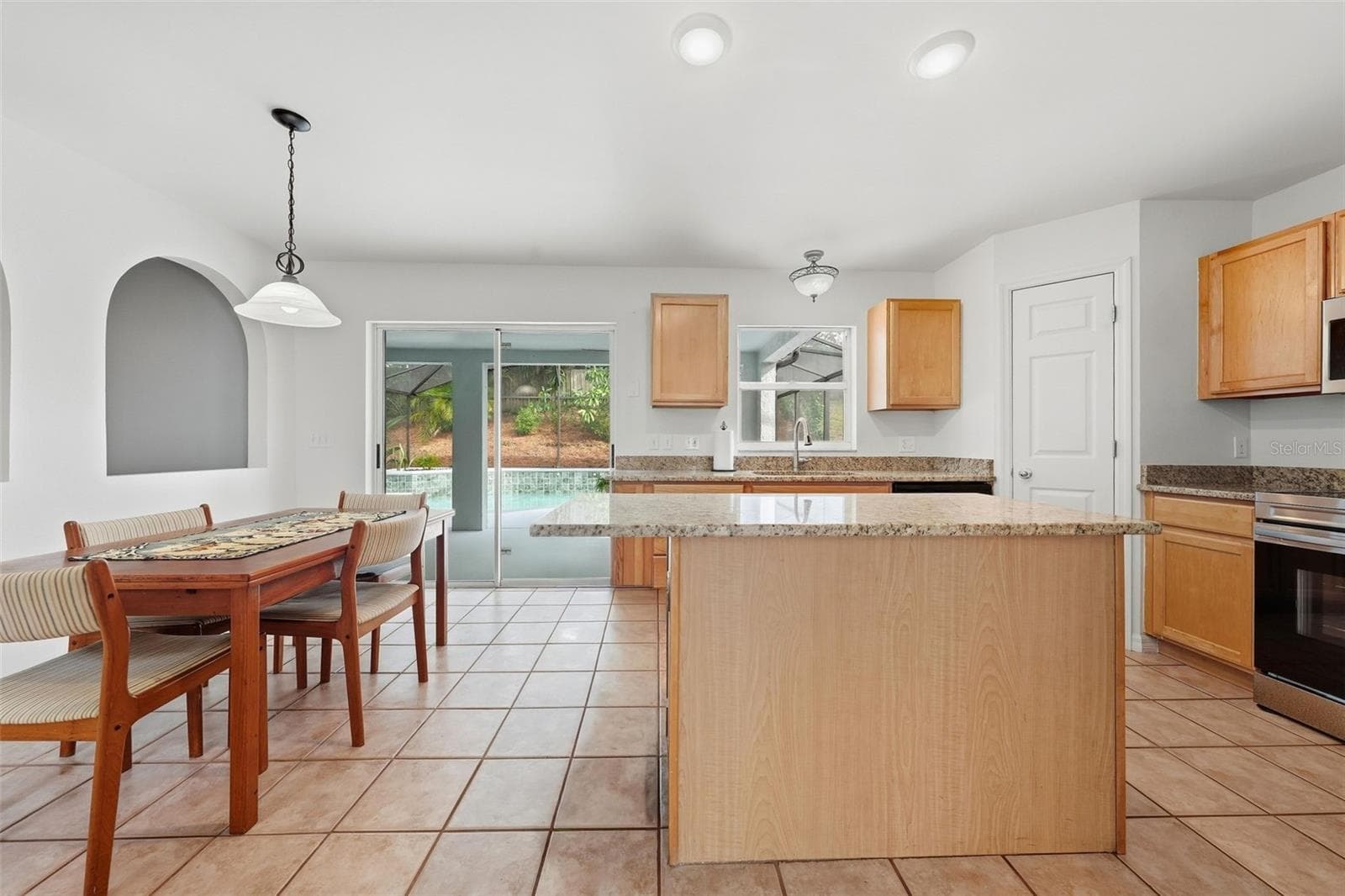 Breakfast Room and Kitchen Opens to Pool Area - 6526 POMEROY CIR, ORLANDO