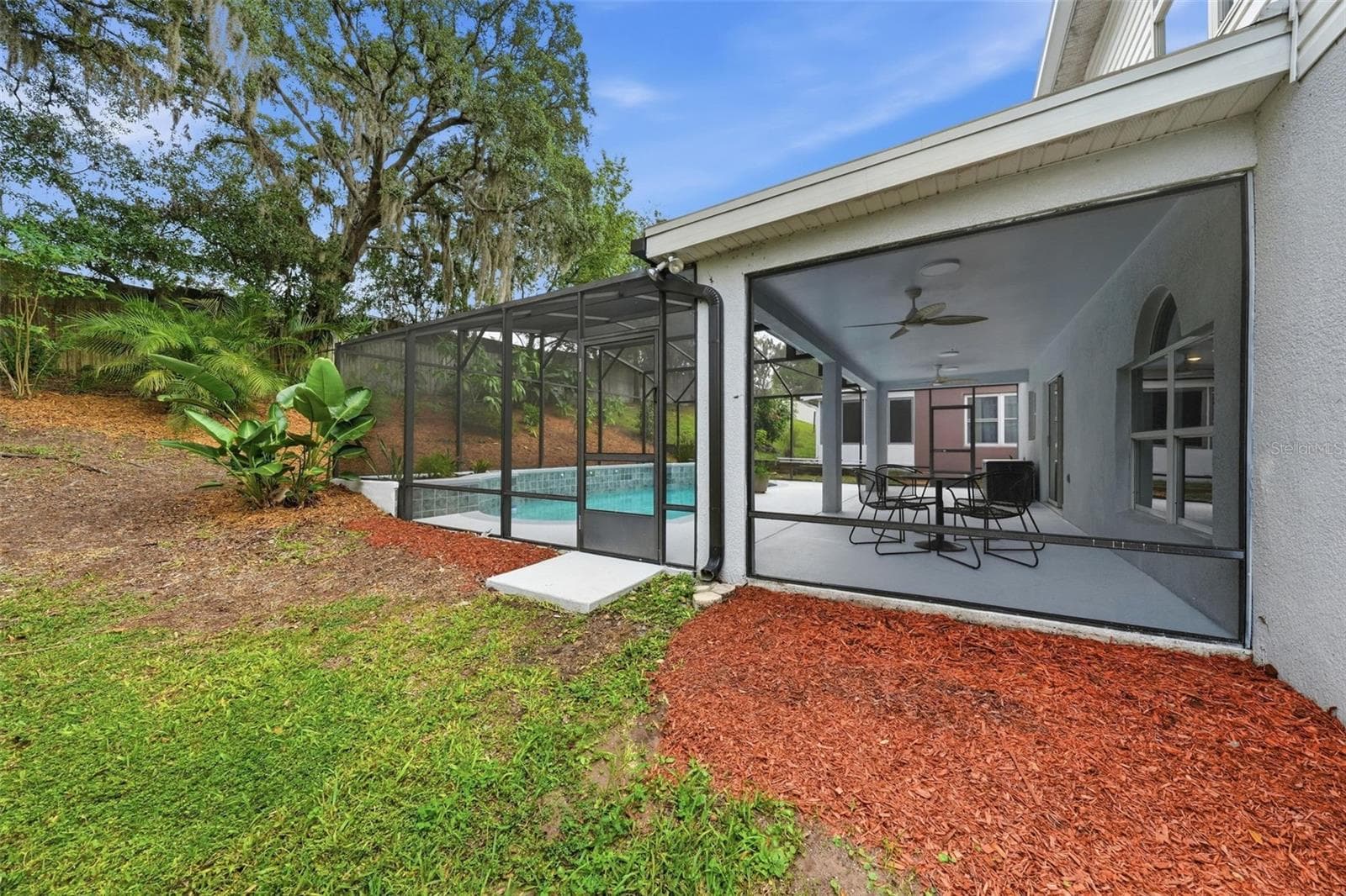 Large Lanai with new roof over Lanai in 2024 - 6526 POMEROY CIR, ORLANDO