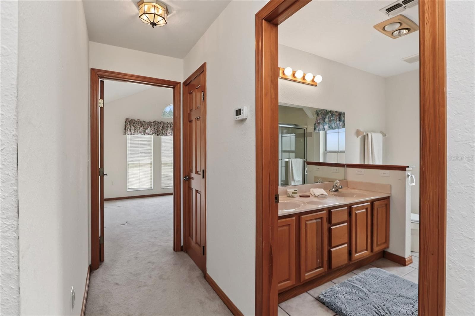Hall and guest bath - 9479 SE 70TH TER, OCALA