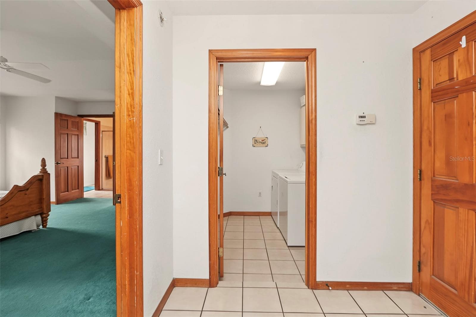Hall to laundry room - 9479 SE 70TH TER, OCALA