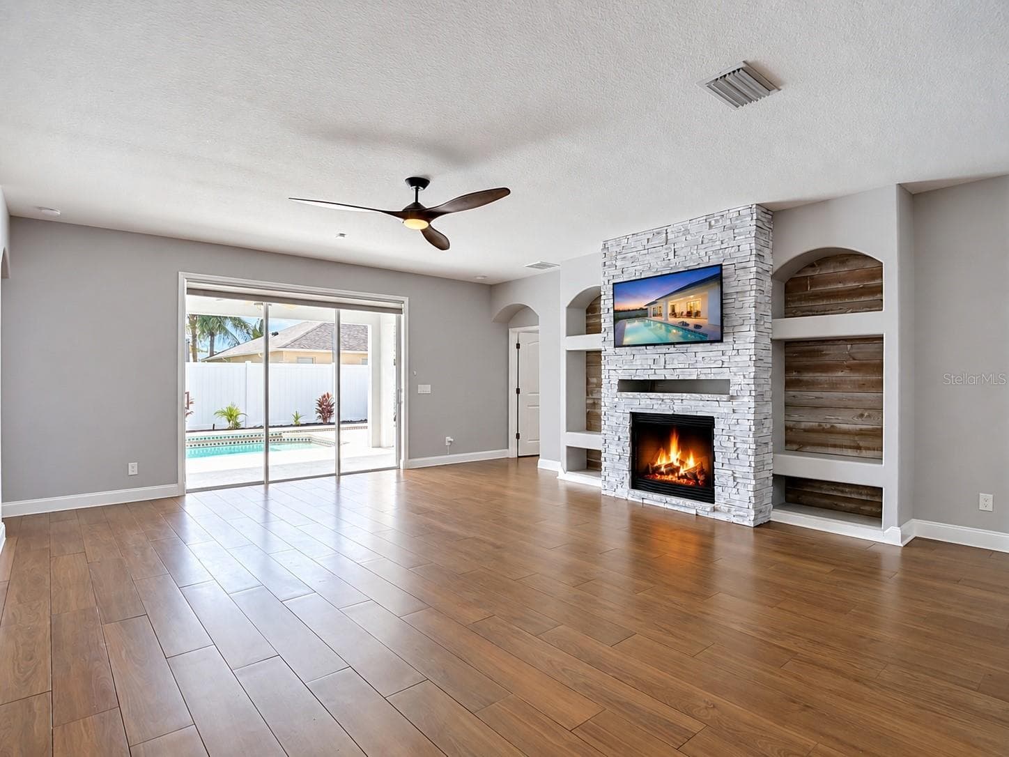 Family Room with Gas Fireplace - 18316 CYPRESS HAVEN DR, TAMPA