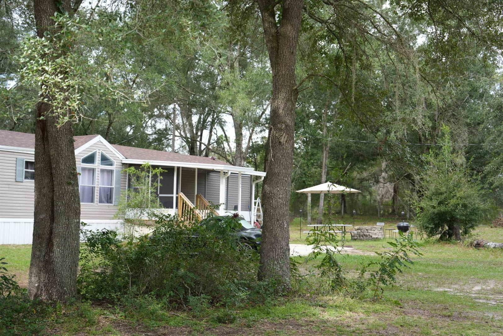 Manufactured Home at 12330 NE 77TH CT, BRONSON, photo 39 of 51