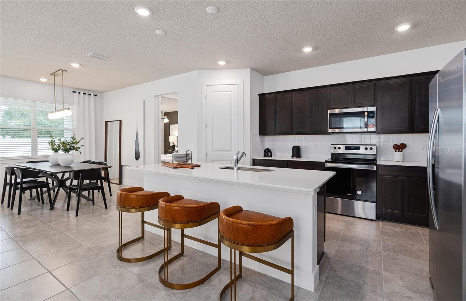 Model Home Design Only. Pictures and furnishings are for illustrative purposes only. Elevations, colors and options may vary. Furniture is for model home staging only.? - 2005 GROVE MEADOW STREET, DELAND