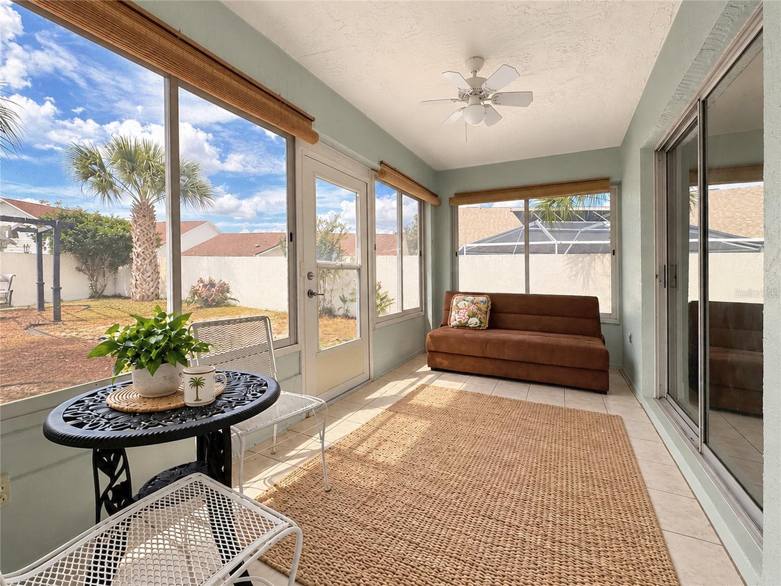Lanai with sliding windows (floor rug is different) - 1318 BALBOA CT, THE VILLAGES