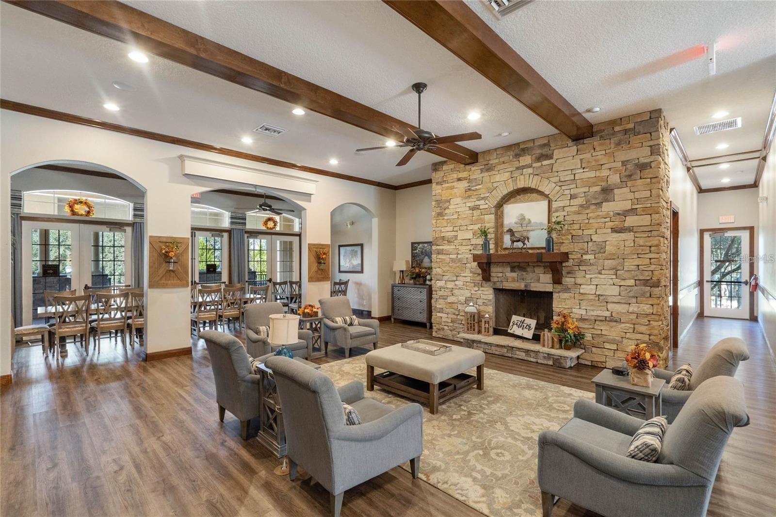 Enjoy a leisurely time gathering around the clubhouse fireplace - 20930 SULLIVAN RANCH BLVD, MOUNT DORA