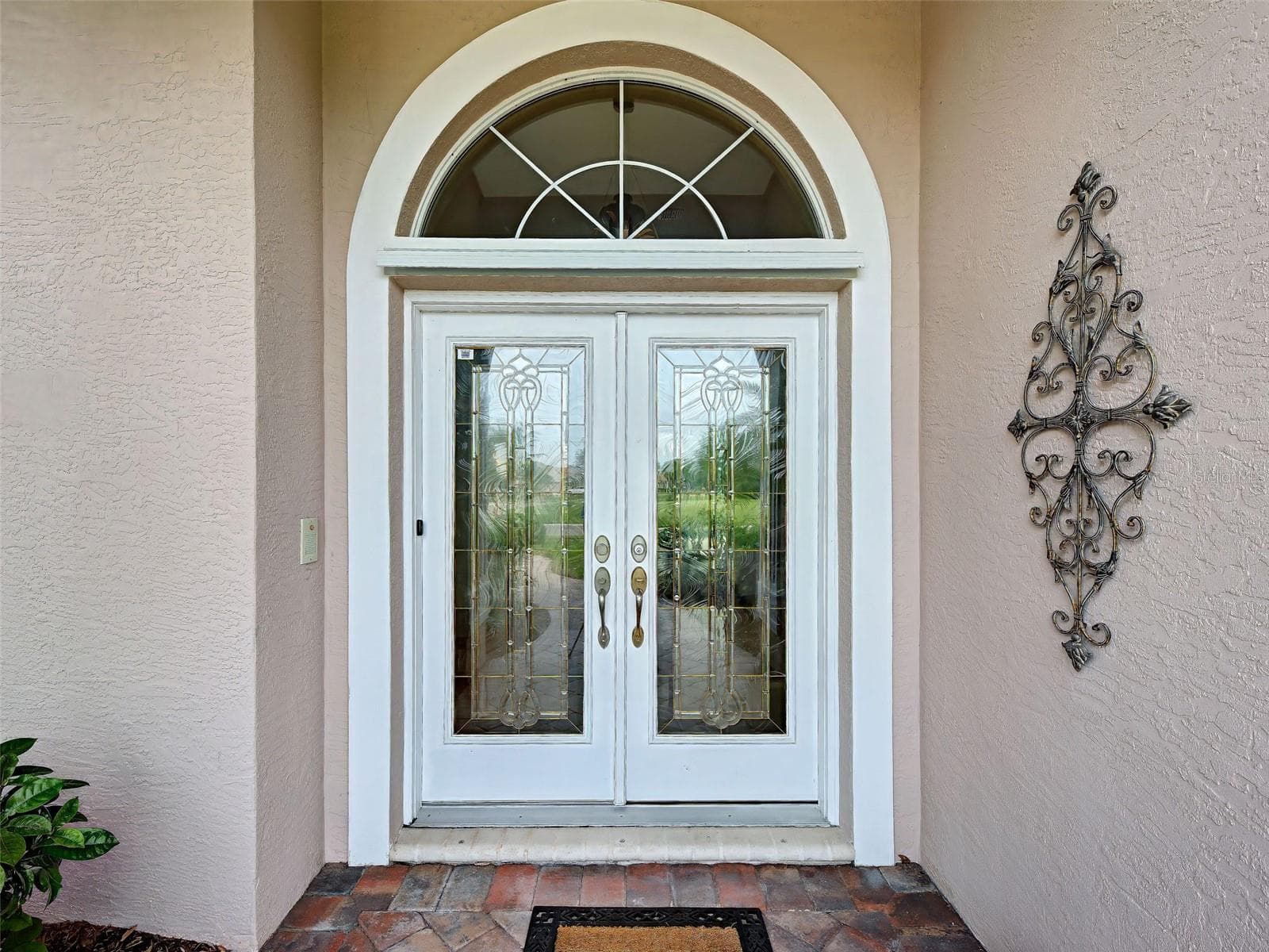Semi-custom J & J built home makes such an impact with its paver path, lead double doors and gracious entryway. - 692 EGRET WALK LN, VENICE