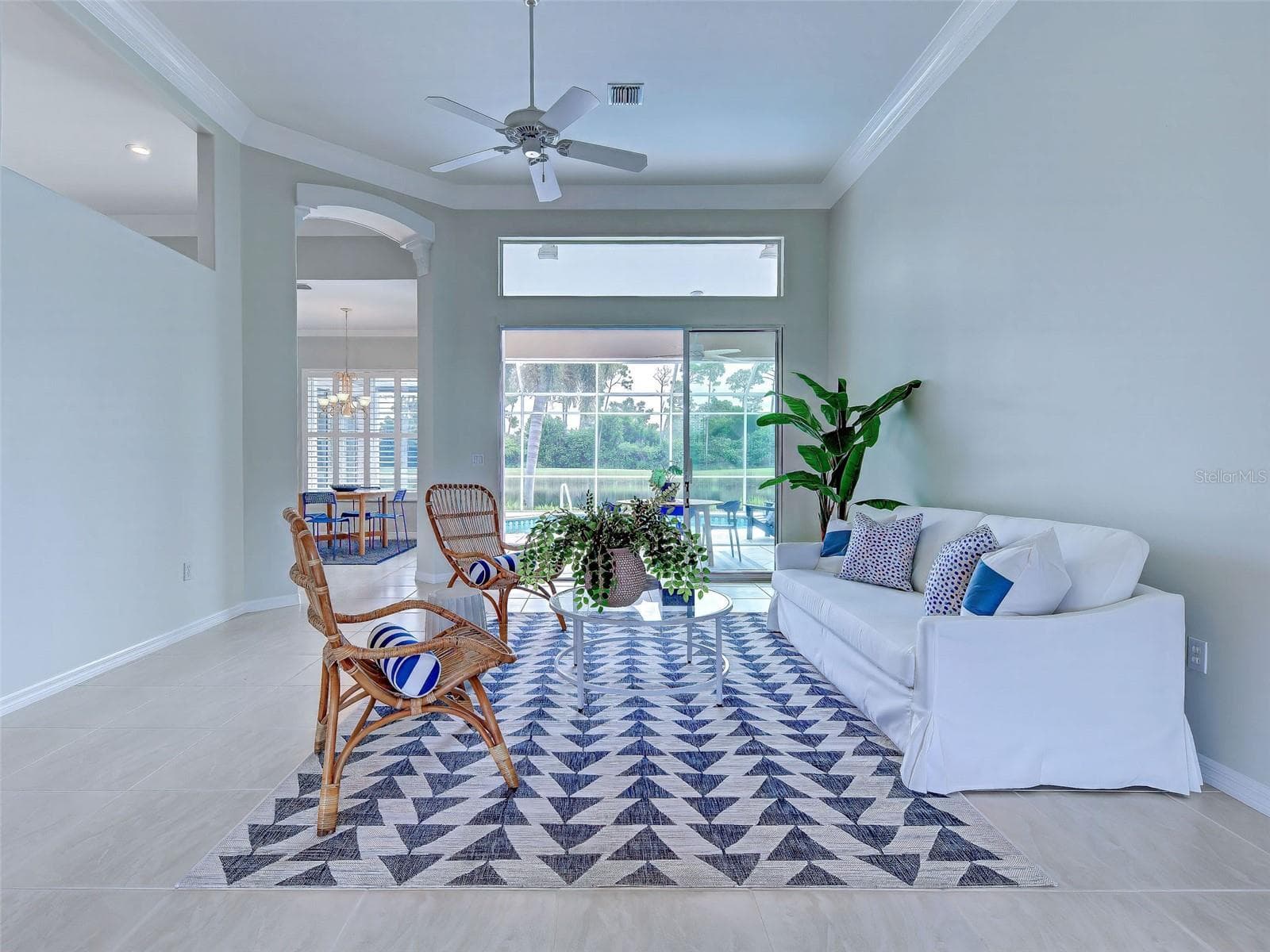 Wow! Wow! Wow!  Spectacular view greets you when you enter this special home. 11 foot ceilings draw the eye up and the many windows flood the home with an abundance of natural light. - 692 EGRET WALK LN, VENICE
