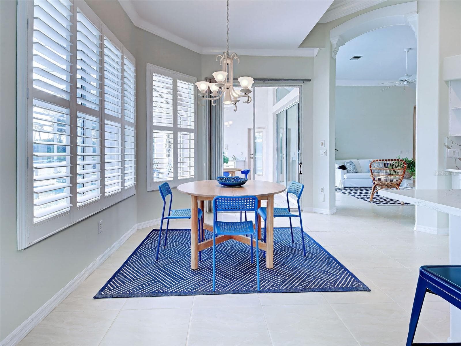 Or enjoy a casual meal in the breakfast, conveniently located just off the kitchen with sliders to the lanai. - 692 EGRET WALK LN, VENICE