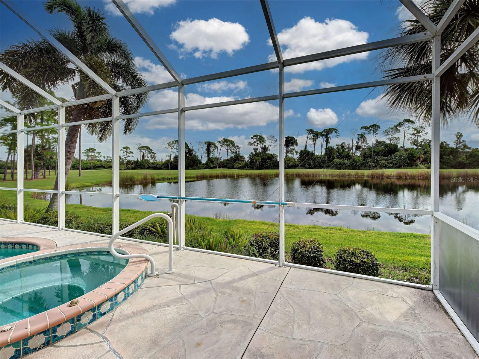 Spacious lanai has plenty of space for lounge chairs or table to dine under the stars. - 692 EGRET WALK LN, VENICE