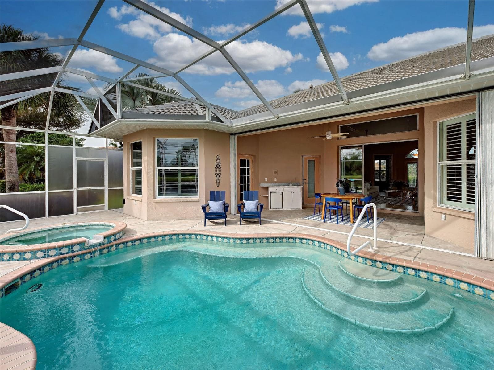 Over-sized lanai with large covered area and accordion hurricane shutters for peace of mind. - 692 EGRET WALK LN, VENICE