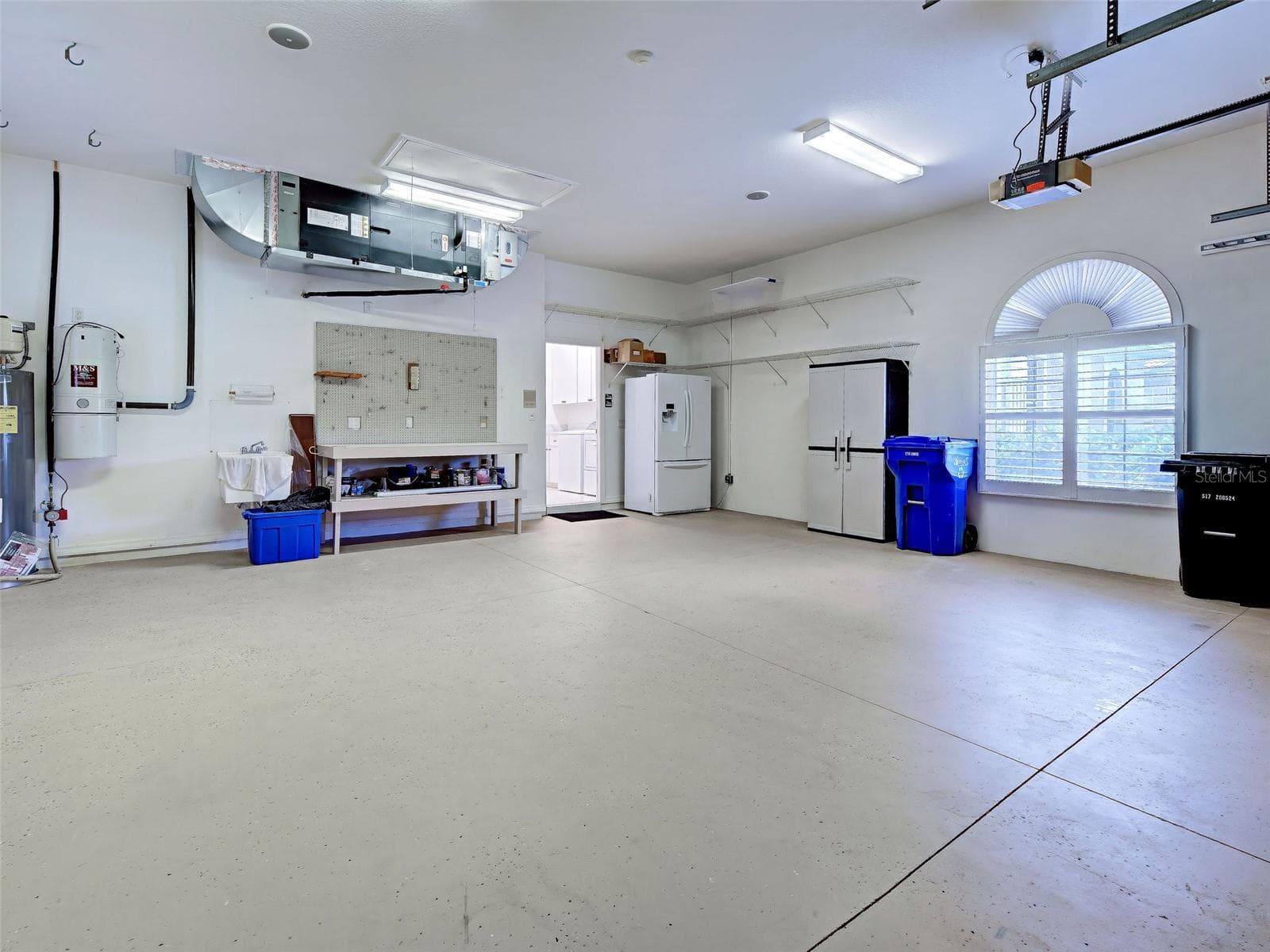 Rare, over-sized (24x26) garage could accommodate your boat or truck. - 692 EGRET WALK LN, VENICE