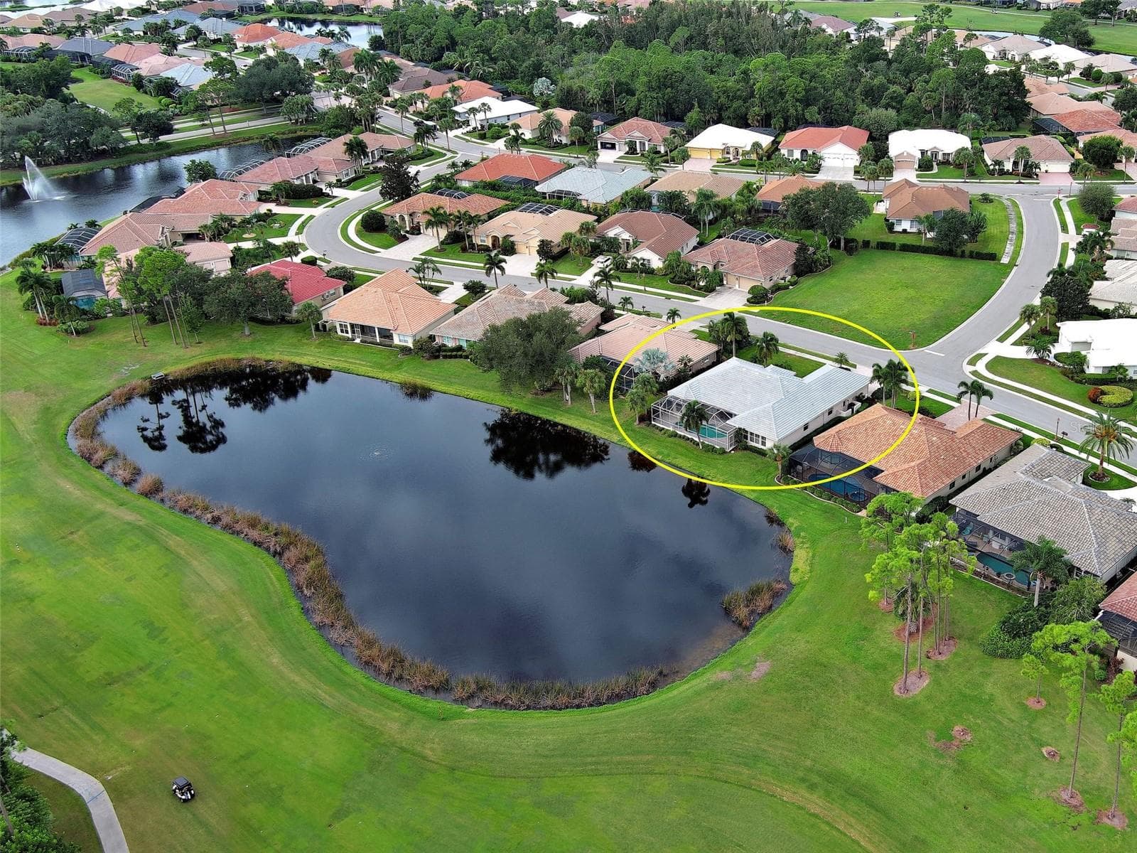 Eagle's view of 692 Egret Walk with lake and 2nd fairway golf course. - 692 EGRET WALK LN, VENICE