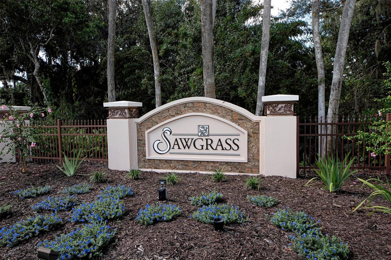 Sawgrass community is in an ideal location - 4 miles to Venice Island, near many stores, restaurants, new Sarasota Memorial Hospital, yet tucked away from the hustle and bustle.  Low HOA fees and no CDD fee are pluses. - 692 EGRET WALK LN, VENICE