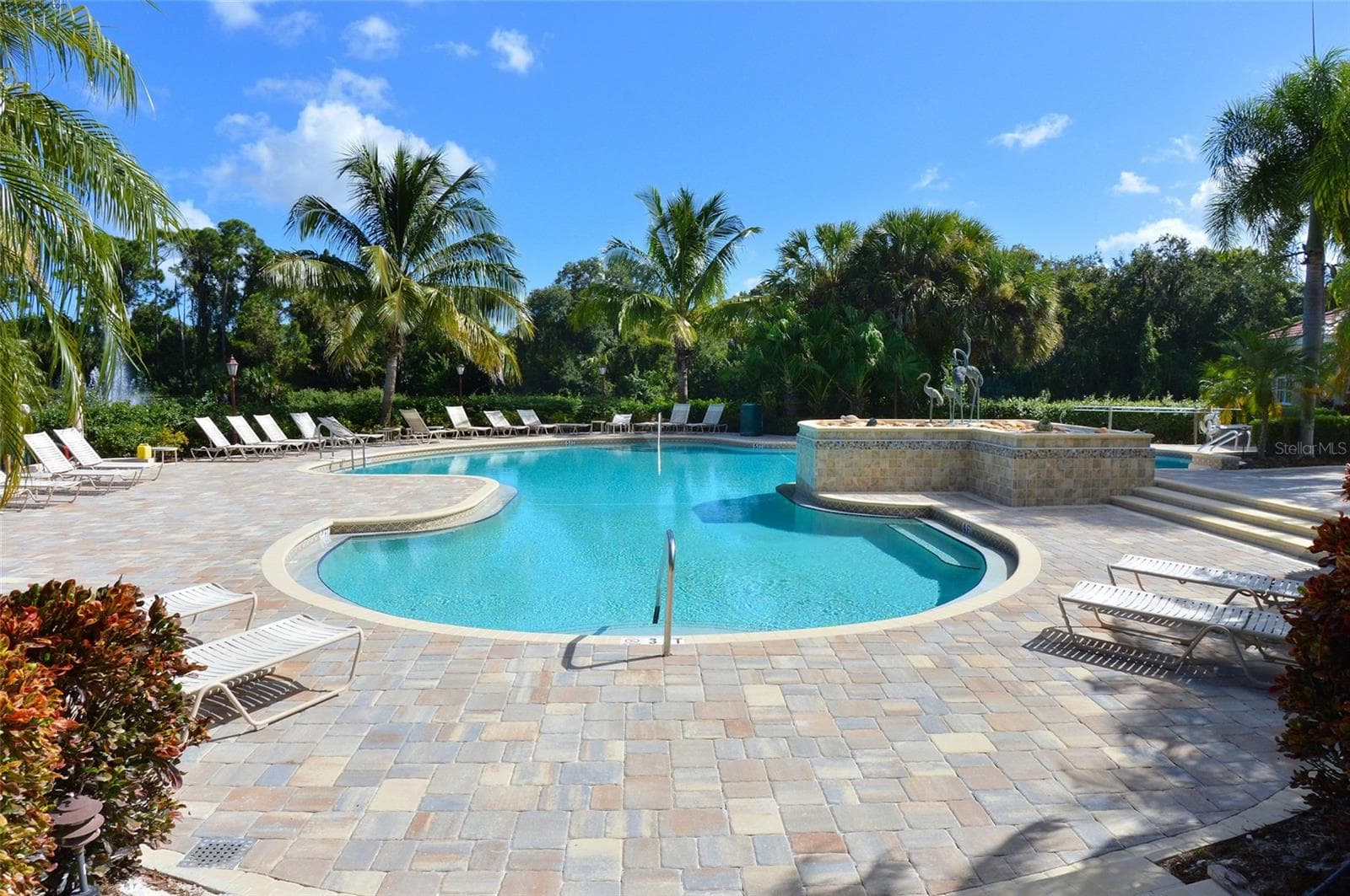 Lounge under a swaying palm tree with your best read or just take a nap enjoying the fabulous weather. - 692 EGRET WALK LN, VENICE