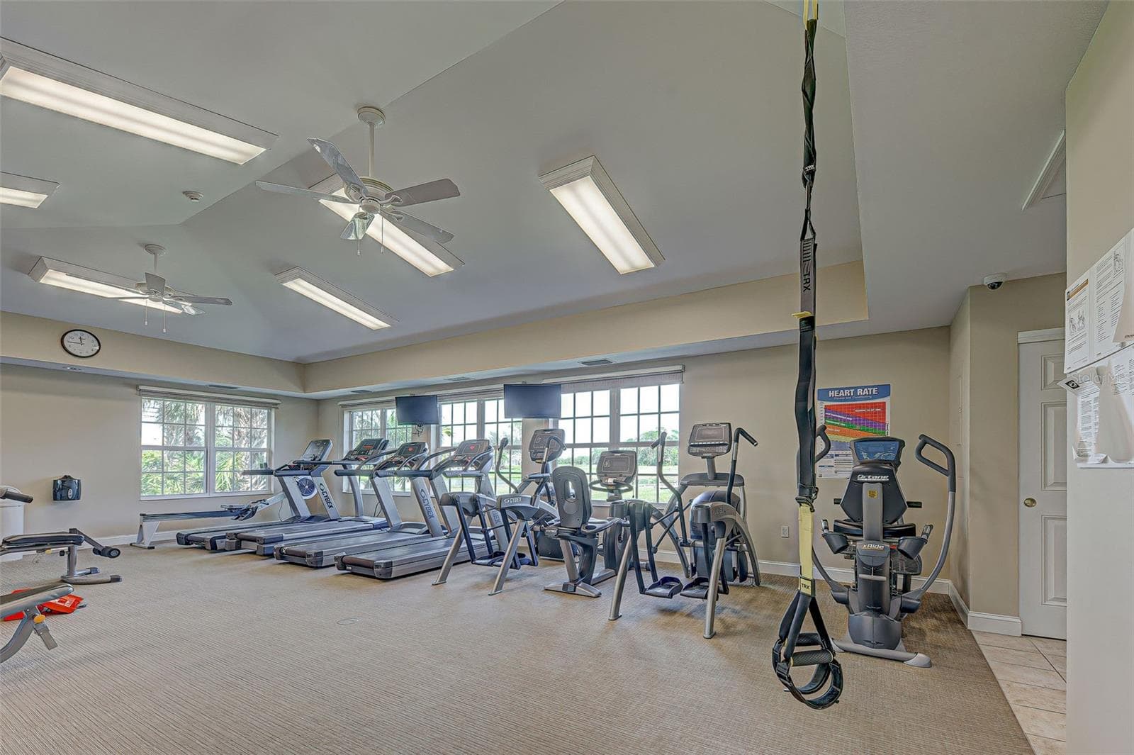 Stay toned in the fitness center. - 692 EGRET WALK LN, VENICE
