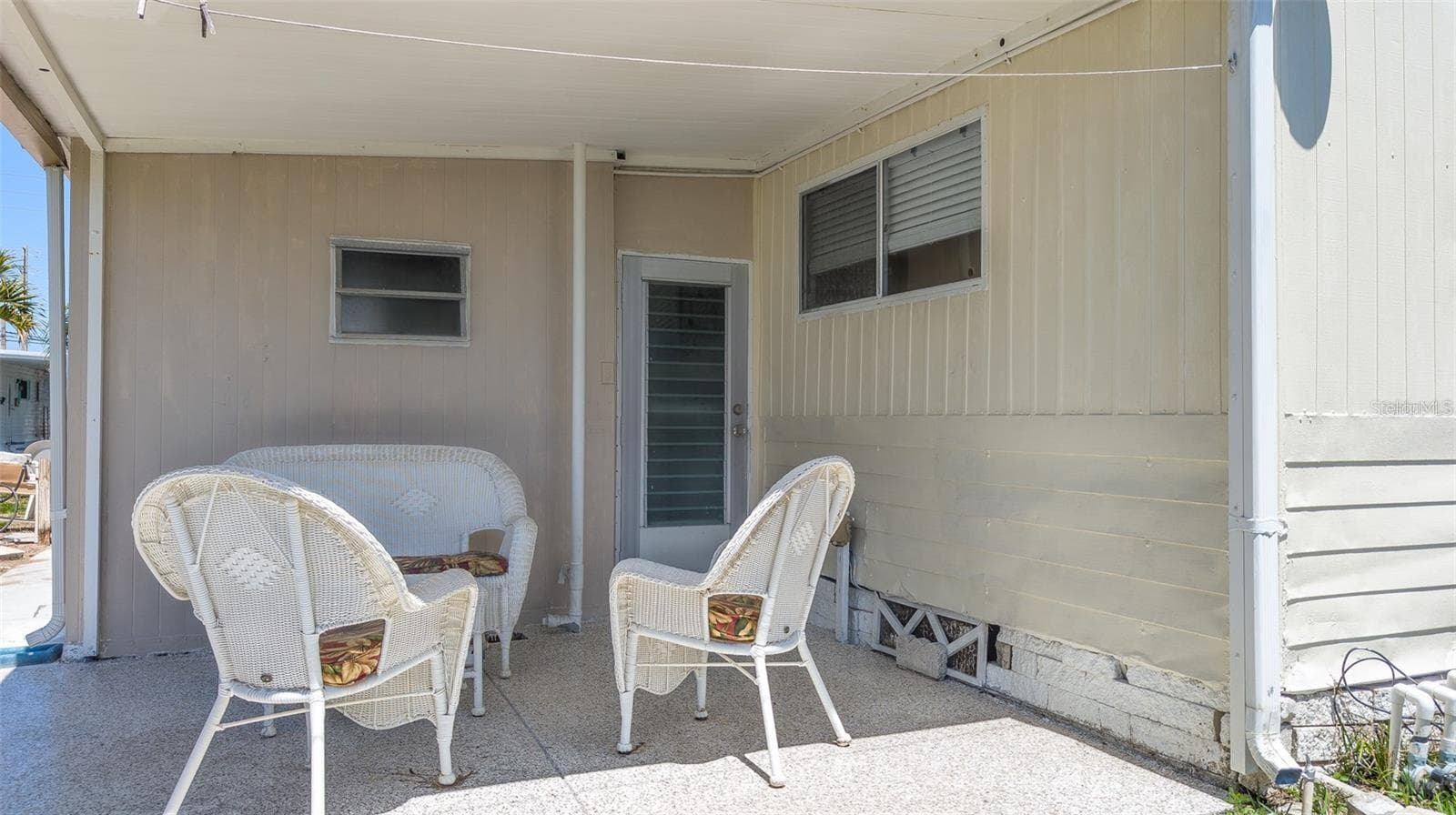 Back covered patio where you could grill food or do projects etc - 229 DIXIE, TARPON SPRINGS