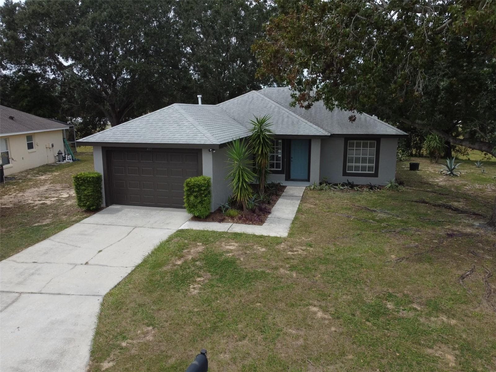 Front With Driveway - 237 WALPOLE LOOP, DAVENPORT