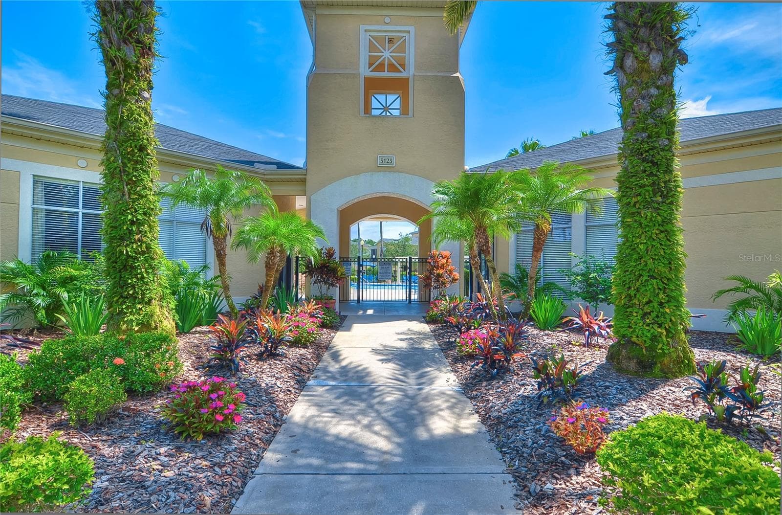Residents enjoy access to Club Tampa Palms, located approximately half a mile away. - 5125 PALM SPRINGS BLVD #3104, TAMPA
