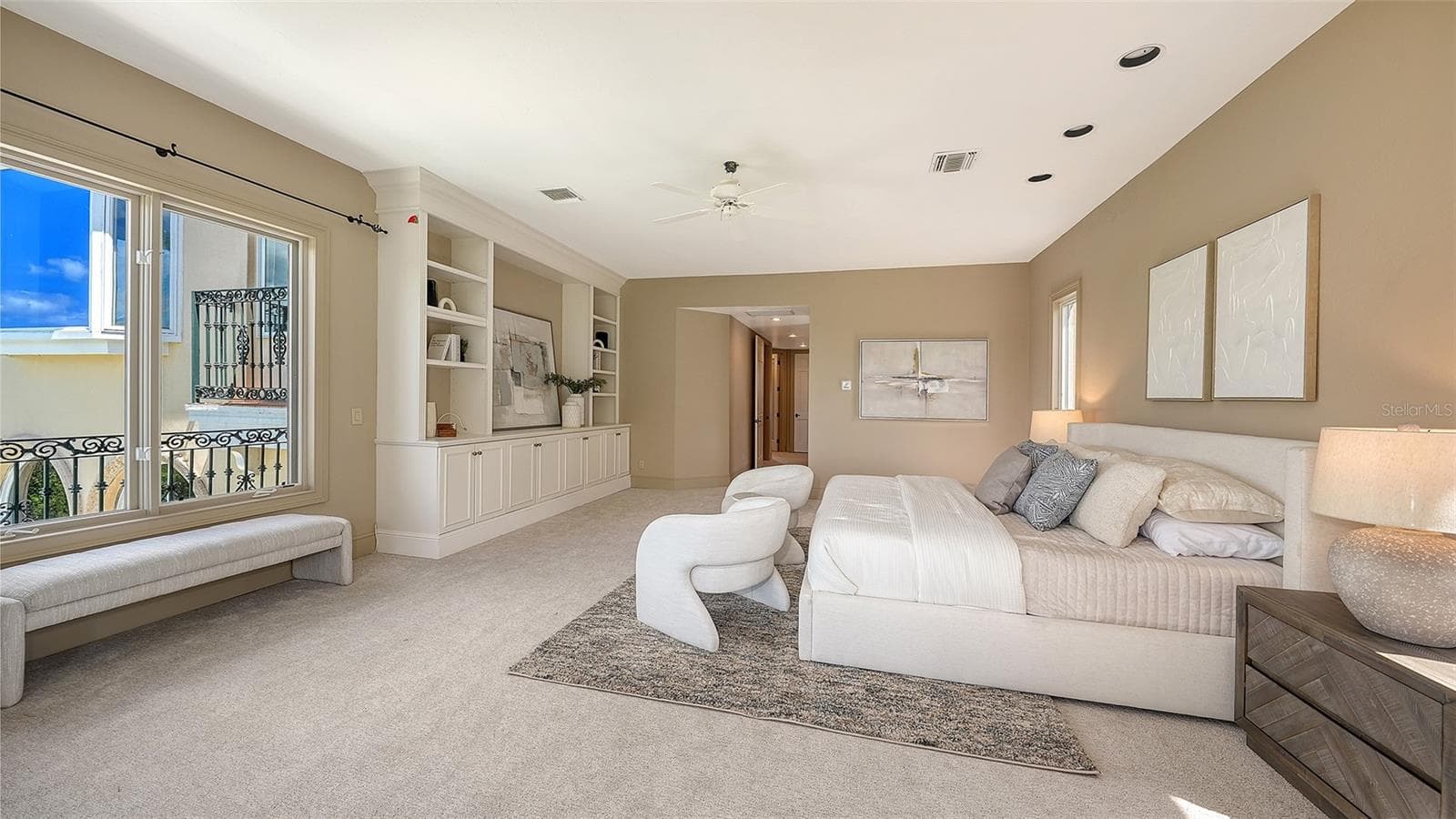 Extensive built ins add architectural interest and exceptional functionality to this spacious private retreat. - 168 COASTAL HAMMOCK CT, OSPREY