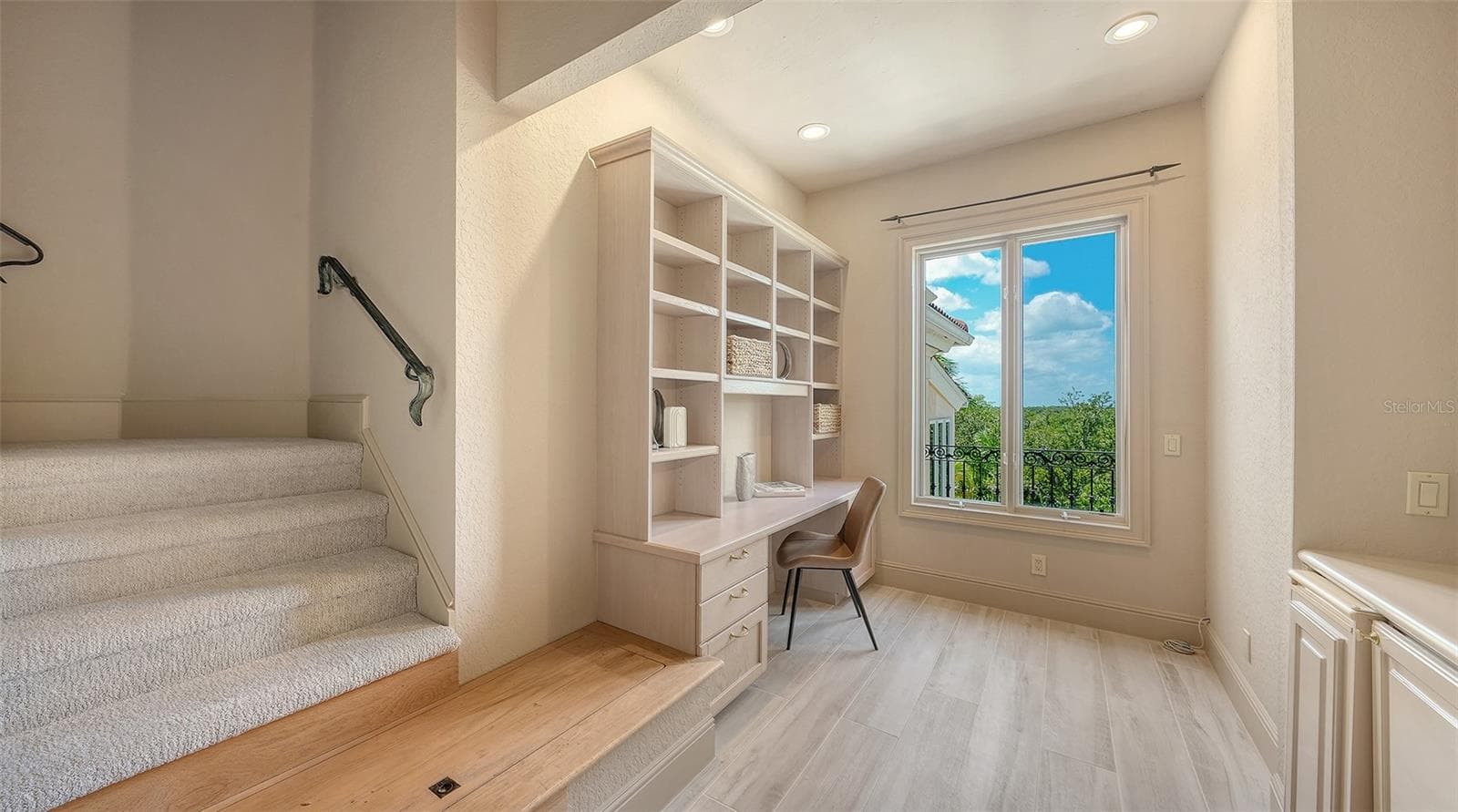 Built in workspace and storage create an ideal setting for a home office, study or additional media area. - 168 COASTAL HAMMOCK CT, OSPREY