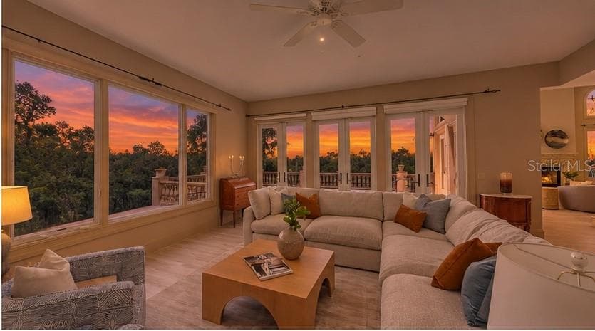 The family room becomes a front row seat to Sarasota's spectacular evening skies. - 168 COASTAL HAMMOCK CT, OSPREY