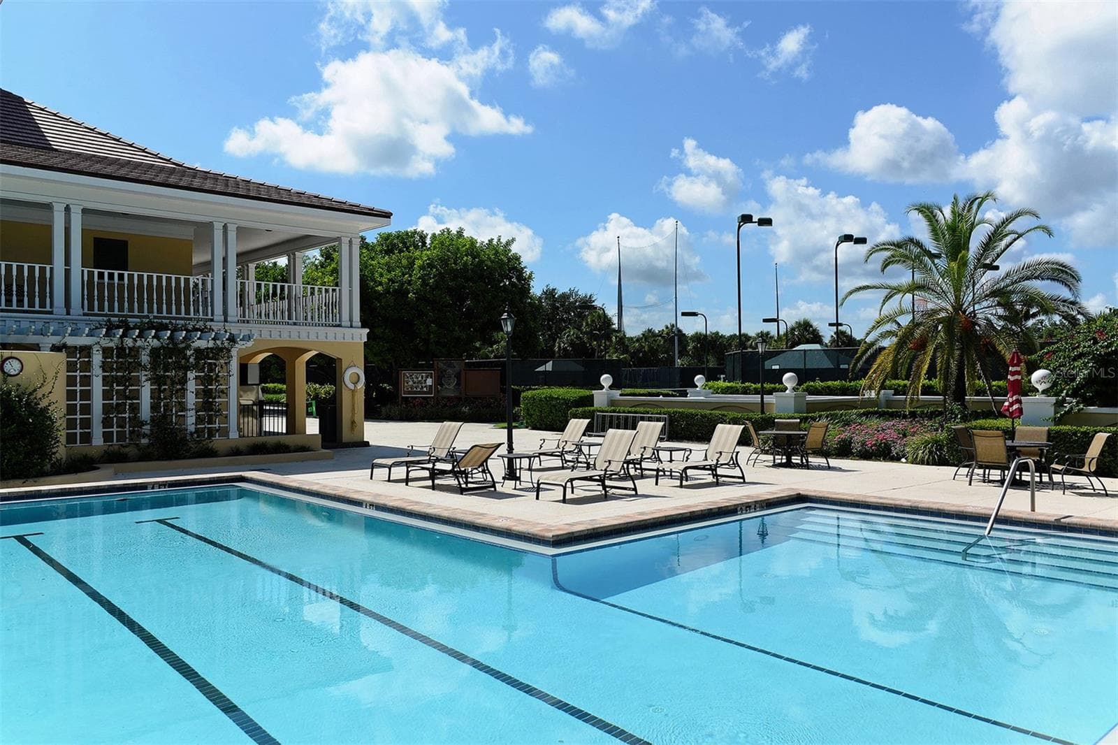 A beautifully maintained club pool provides another inviting option for leisure and recreation. - 168 COASTAL HAMMOCK CT, OSPREY