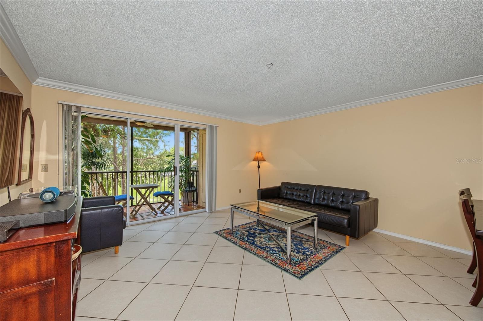 Living Room leading to Balcony - 2400 FEATHER SOUND DR #123, CLEARWATER