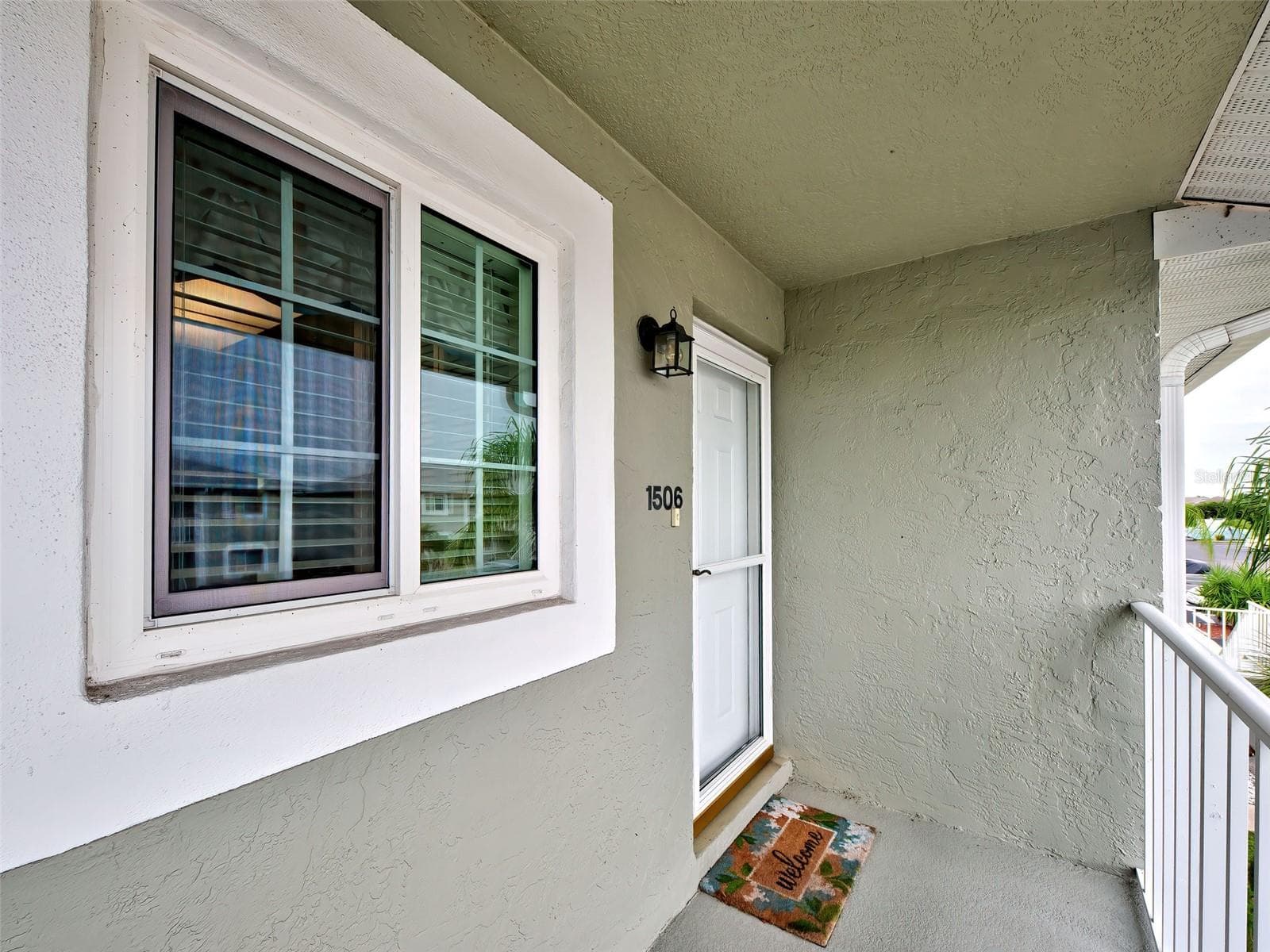 Storm door - 3310 LOVELAND BLVD #1506, PORT CHARLOTTE