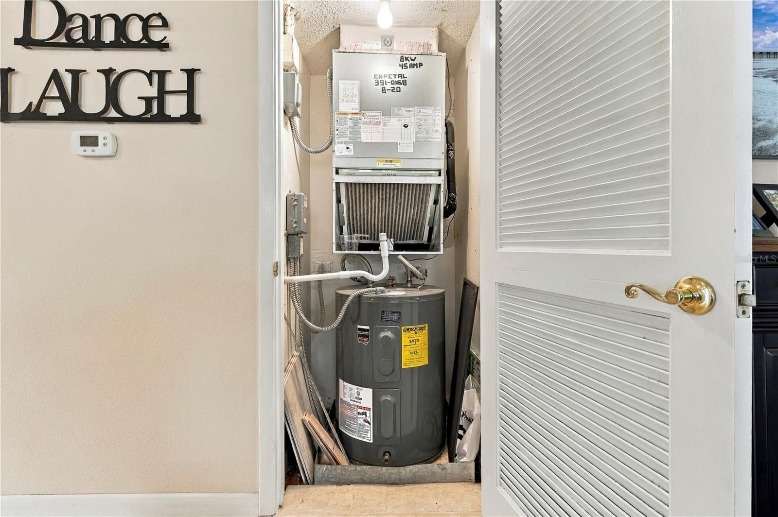 A/C and Hot water closet - 9490 HARBOR GREENS WAY #508, SEMINOLE