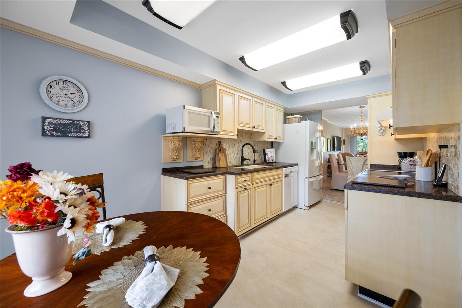 Custom cabinetry. Appliances included, French door Refrigerator, Dishwasher, and Counter Microwave.and Range - 2700 COVE CAY DR #1-3B, CLEARWATER