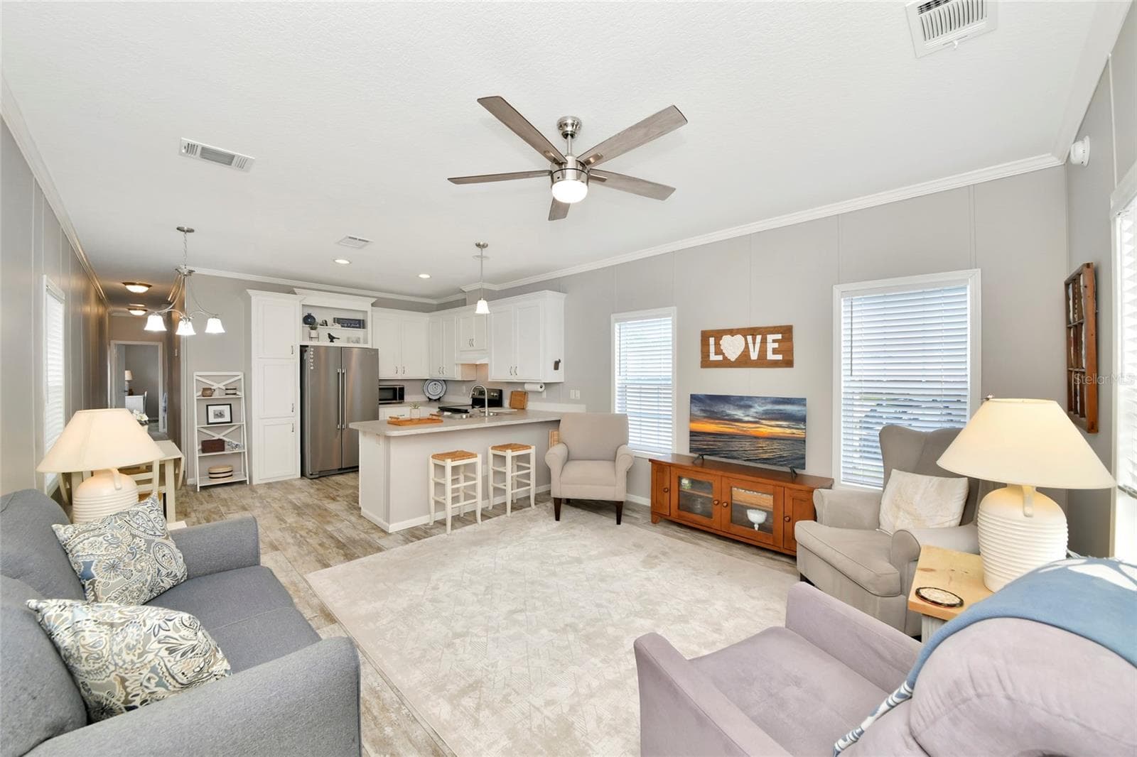 Open concept living with the added touch of high ceilings added to the spacious feeling in this very comfortable home. - 6843 HIKINA DR, NORTH PORT