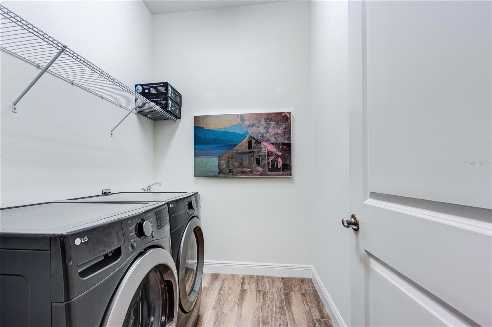 Interior Laundry room with storage above! - 13303 TRAILING MOSS DR, DADE CITY