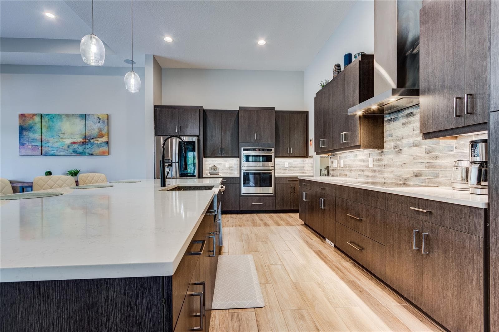 Kitchen had loads of cabinets! - 13303 TRAILING MOSS DR, DADE CITY