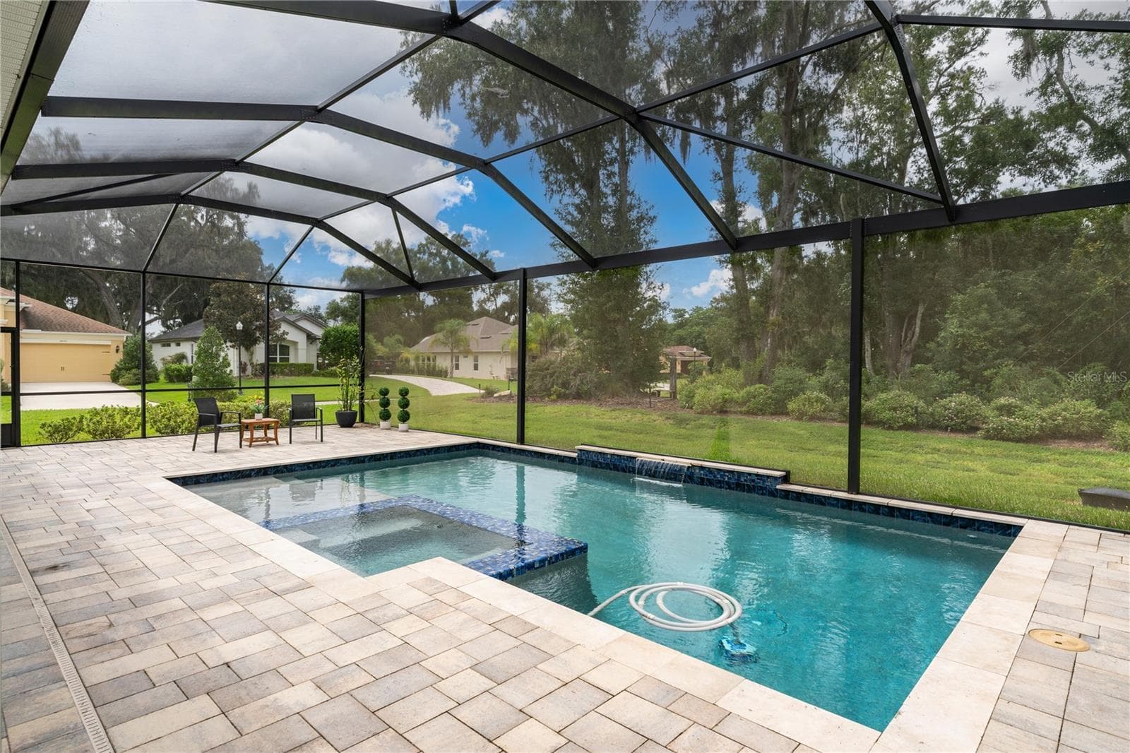 Paver deck to entertain family and friends - 13303 TRAILING MOSS DR, DADE CITY