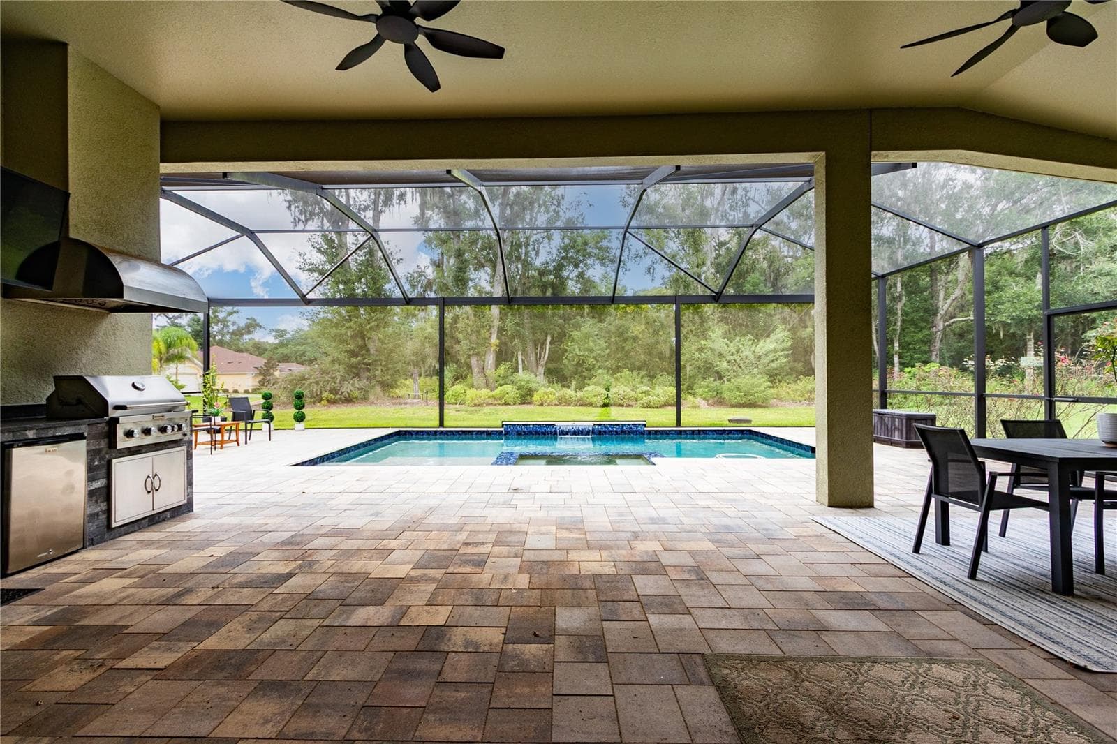 Covered section with ceiling fans - 13303 TRAILING MOSS DR, DADE CITY