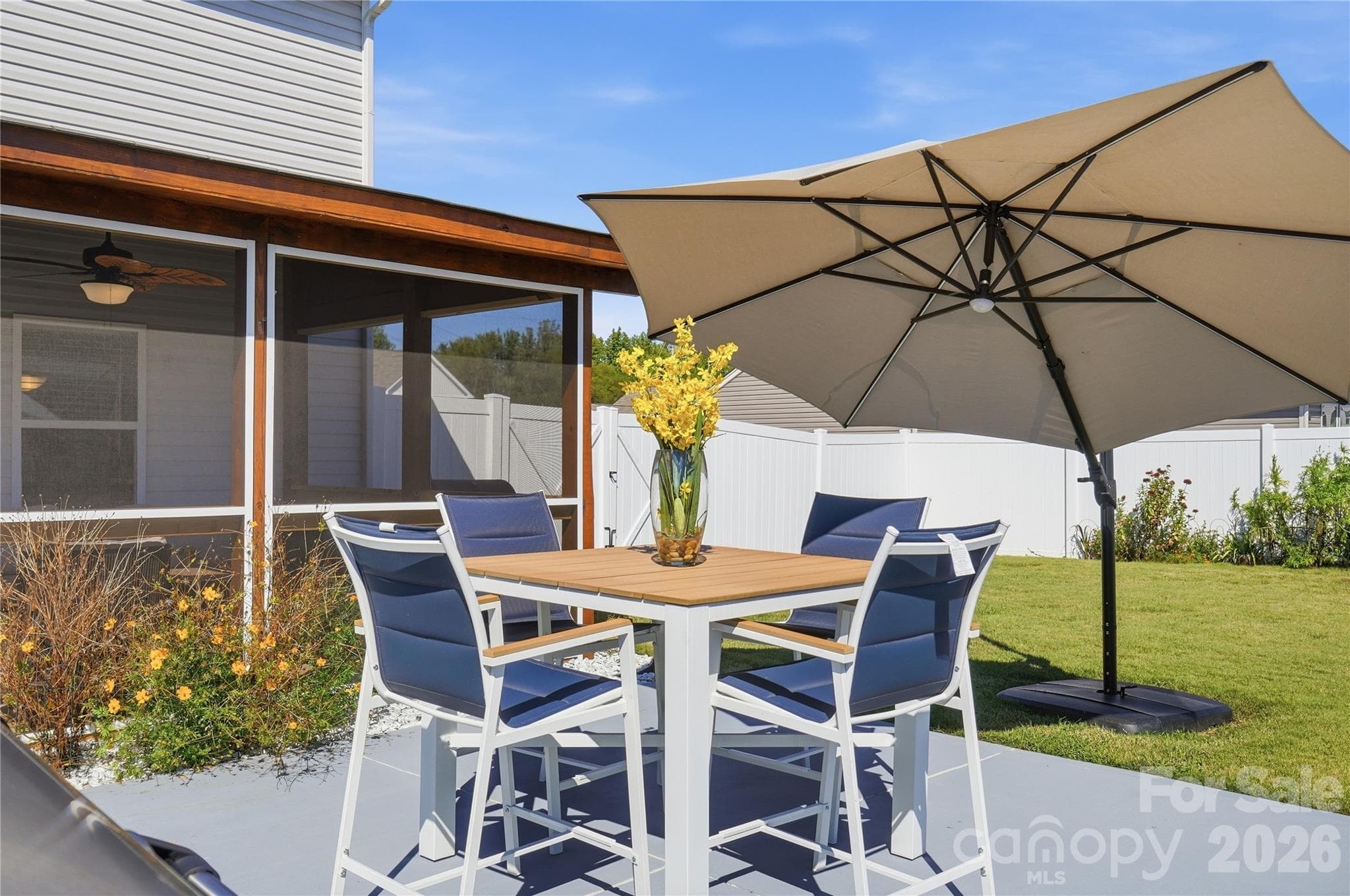 Backyard patio with outdoor dining space - 206 Amberly Circle, Pageland