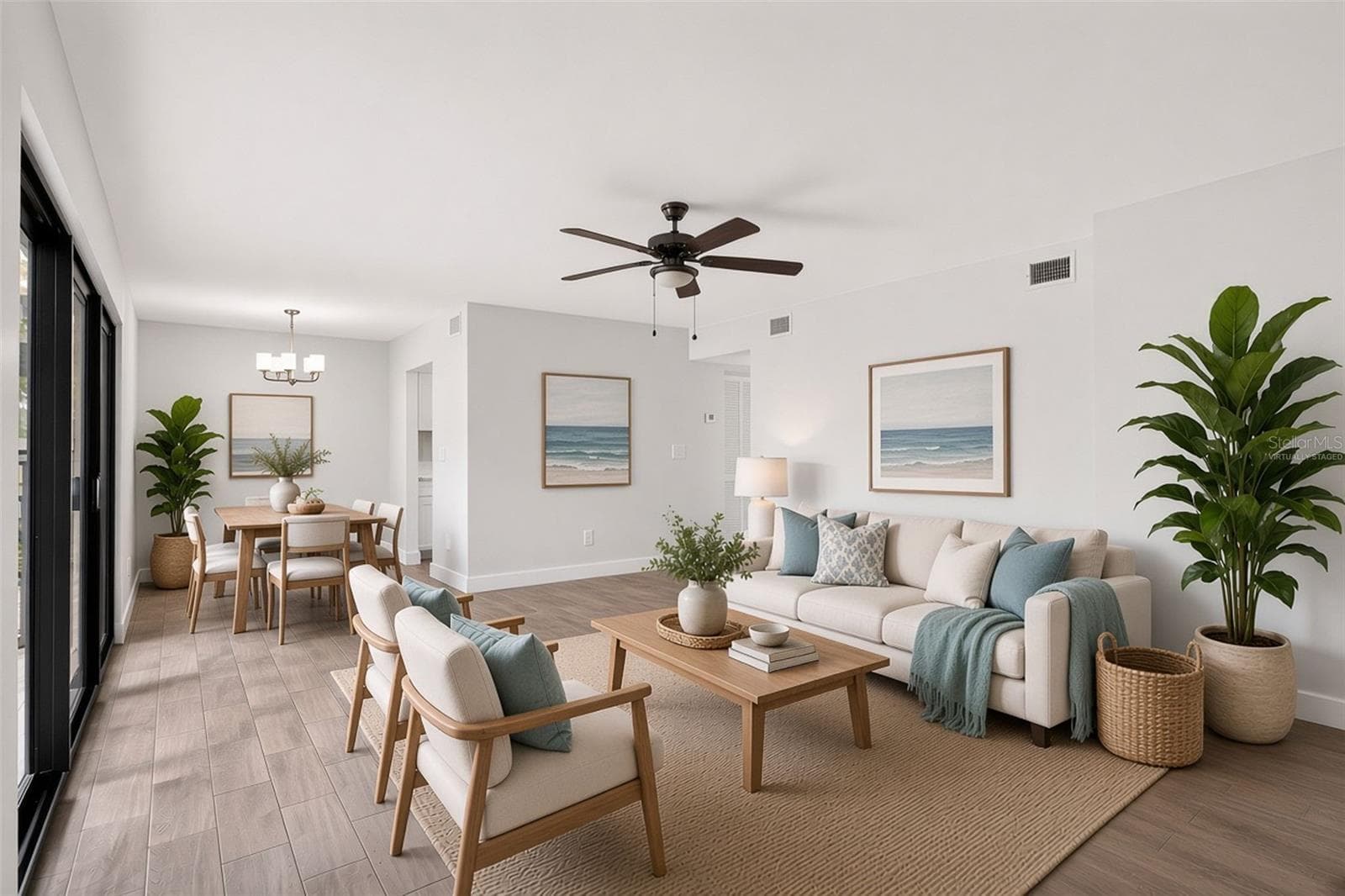 Living room virtually staged - 876 116TH AVE N #103, ST PETERSBURG