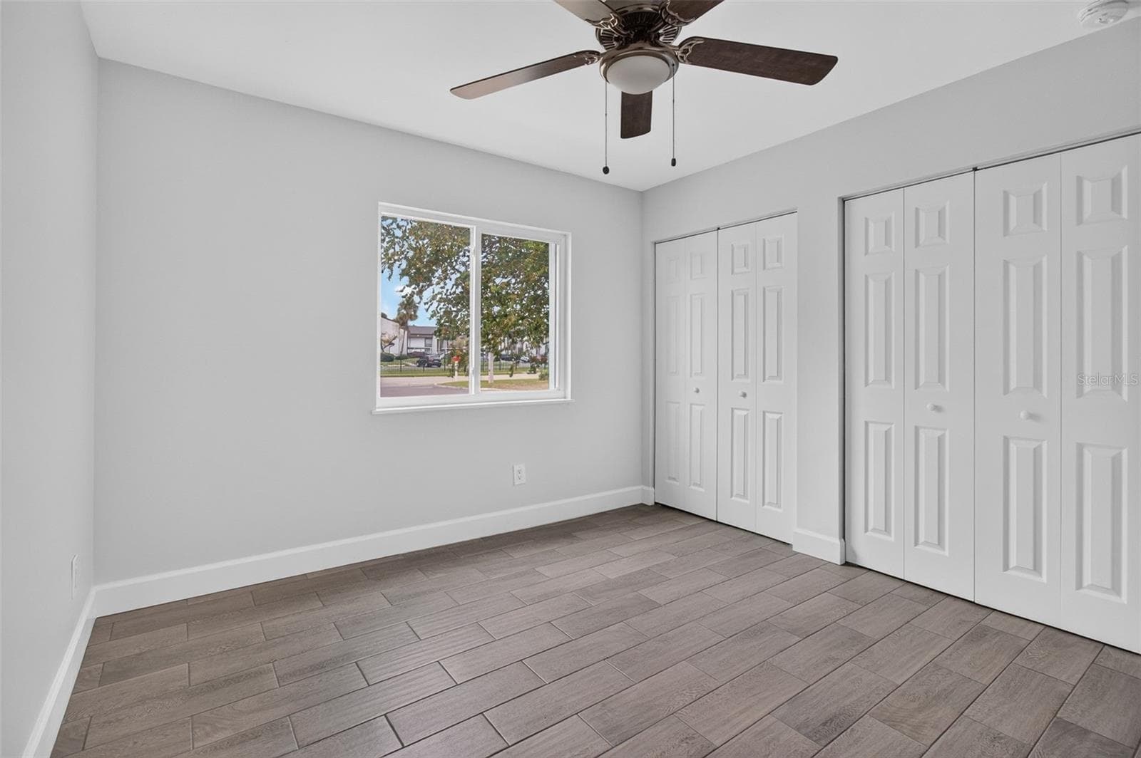 Bedroom two with double closets - 876 116TH AVE N #103, ST PETERSBURG
