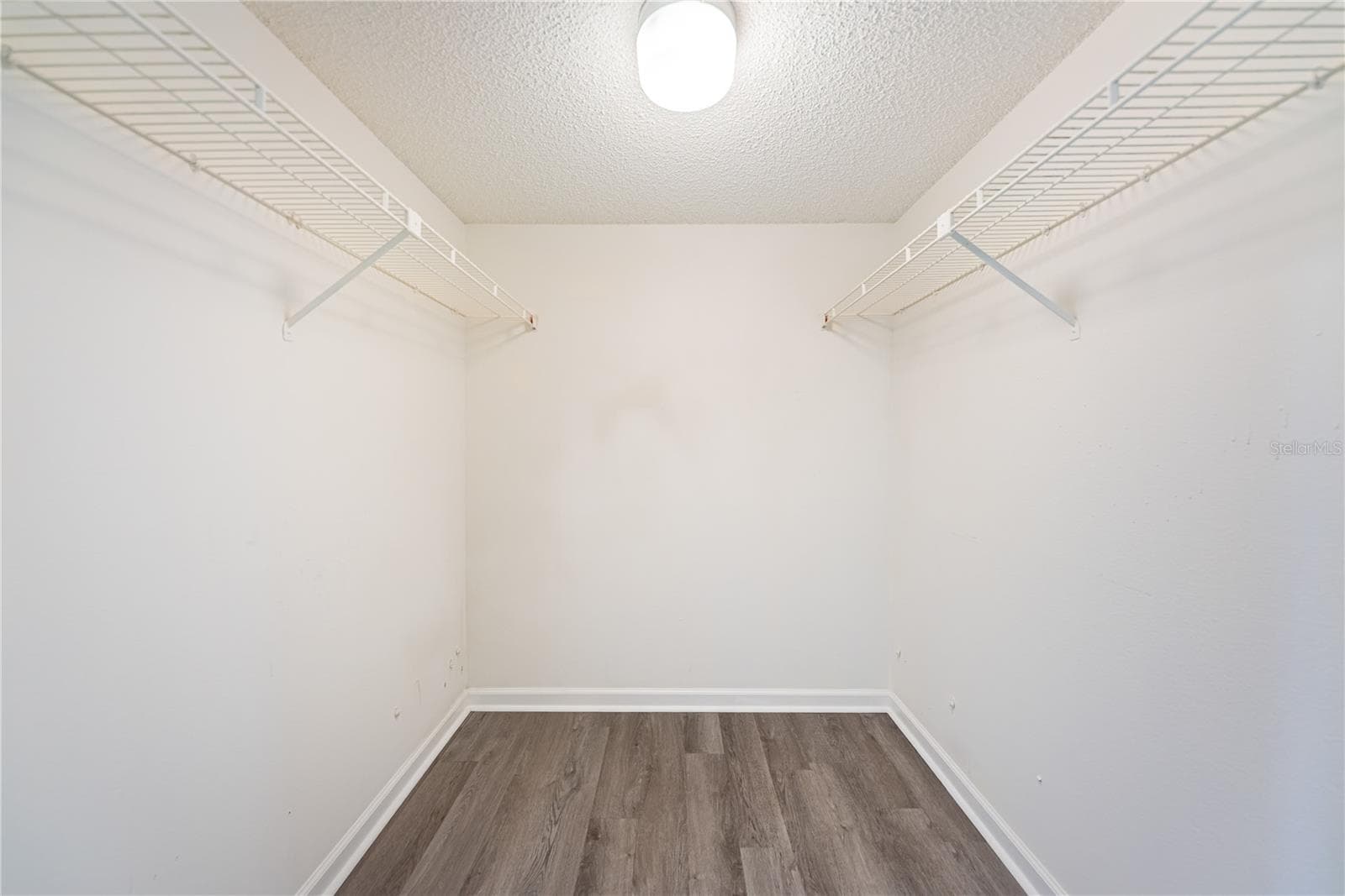 Primary walk-in closet - 2591 COUNTRYSIDE BLVD #5106, CLEARWATER