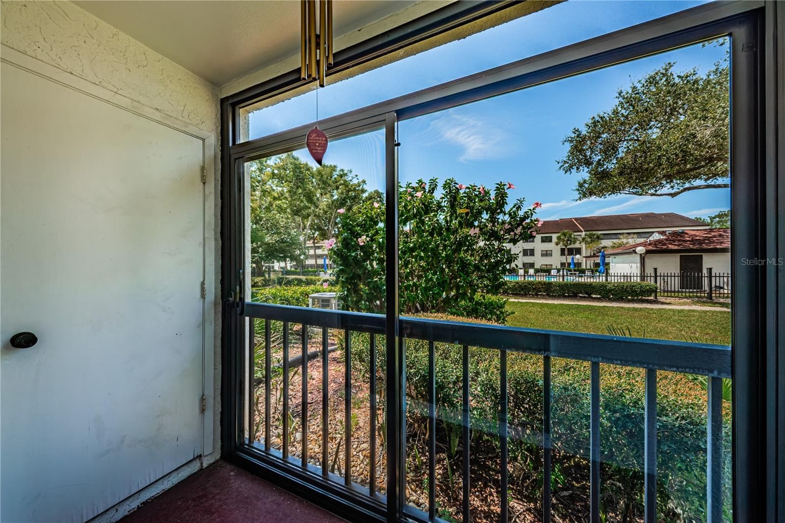Patio outside Primary Bedroom w/storage room - 2591 COUNTRYSIDE BLVD #5106, CLEARWATER