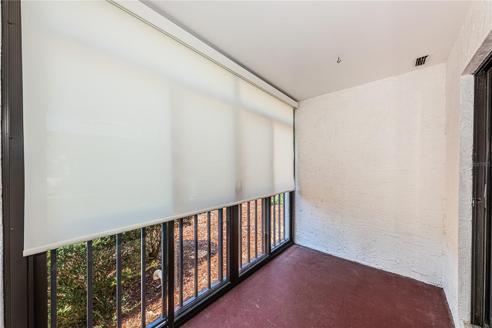 Patio off living room and guest bedroom - 2591 COUNTRYSIDE BLVD #5106, CLEARWATER