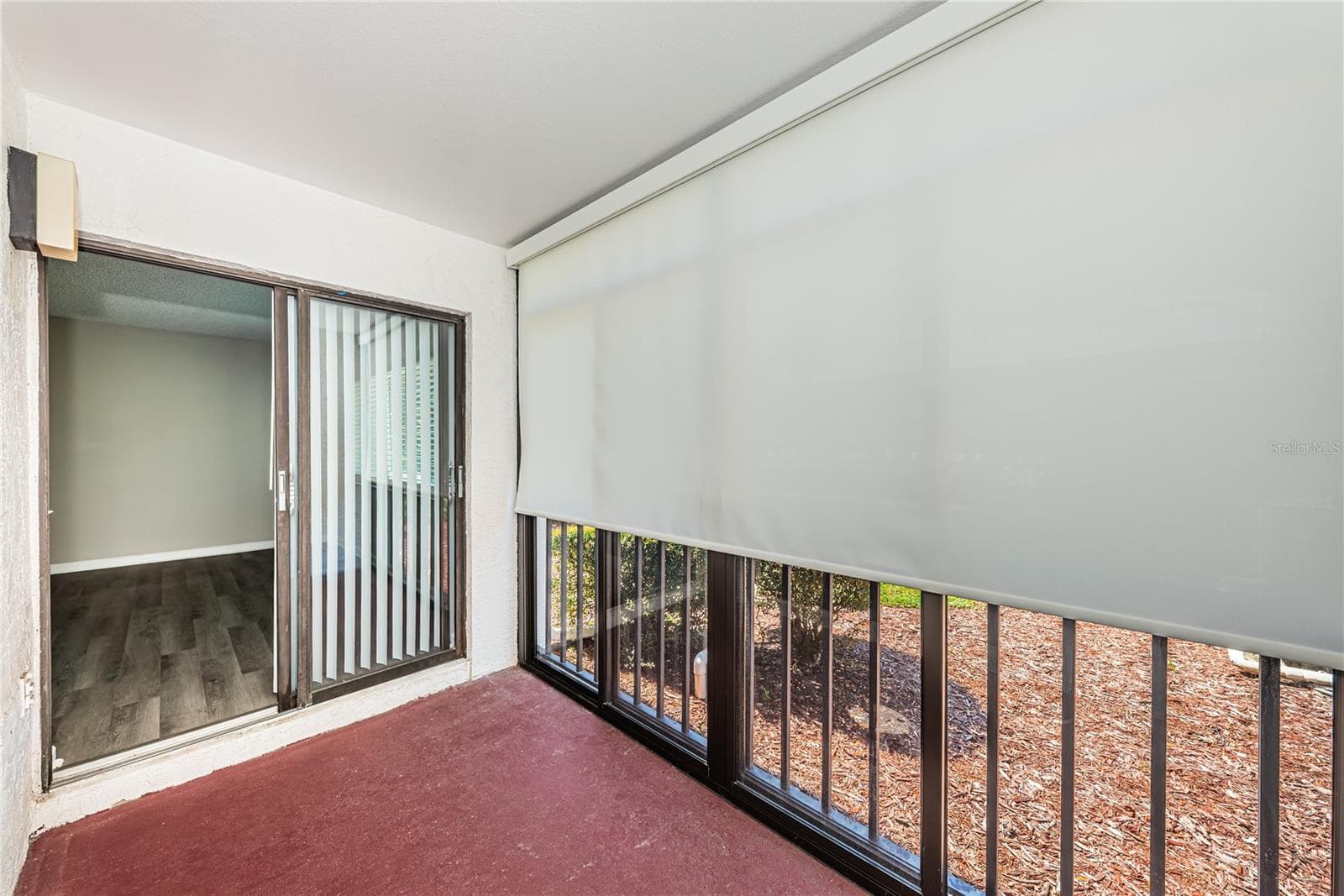 Patio off living room and guest bedroom - 2591 COUNTRYSIDE BLVD #5106, CLEARWATER