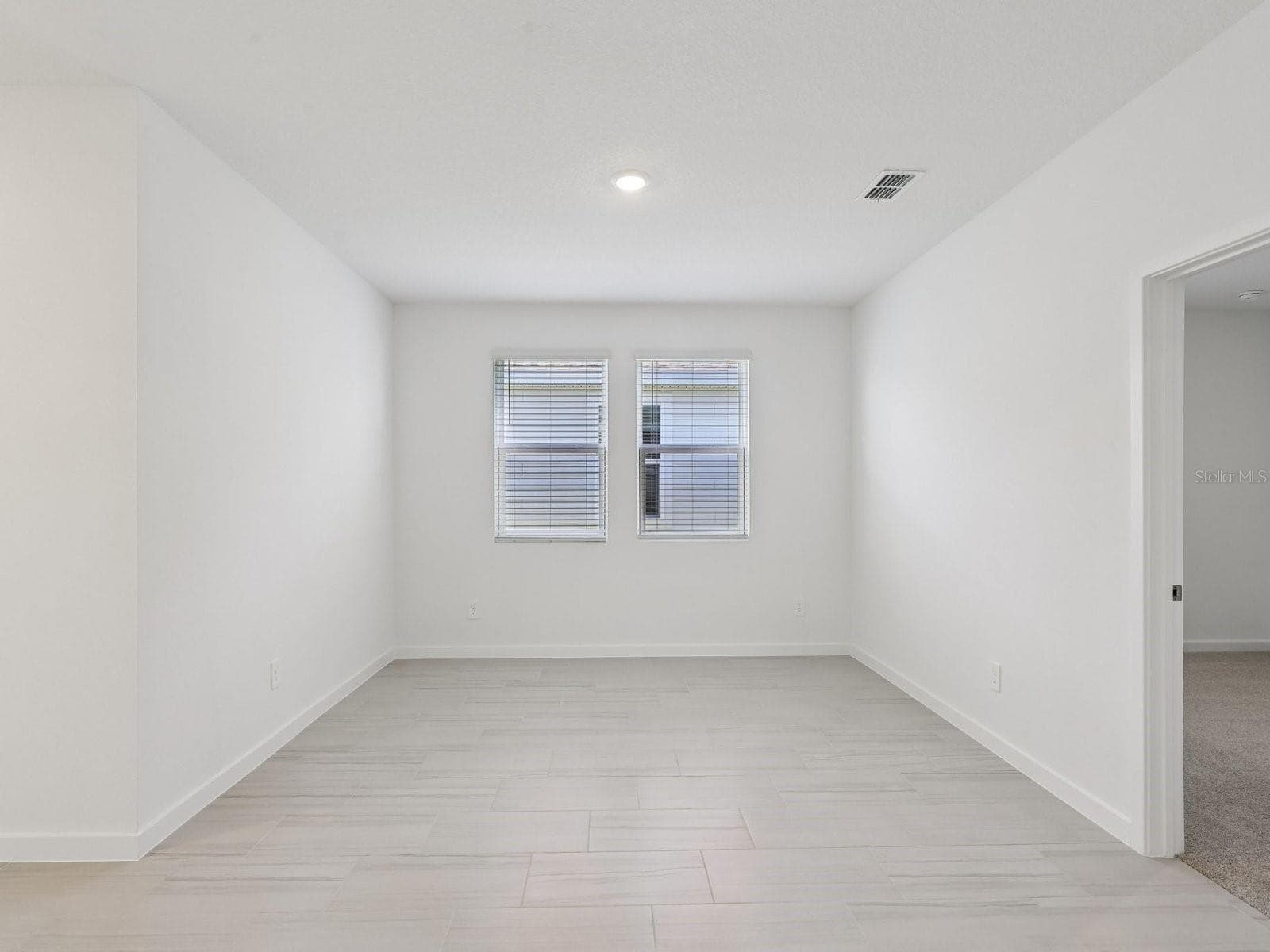 Photo is not of the actual home, but is an inspirational photo of builder’s model home and may depict options, furnishings, and/or decorator features that are not included - 41 GARNI DR, PALM COAST