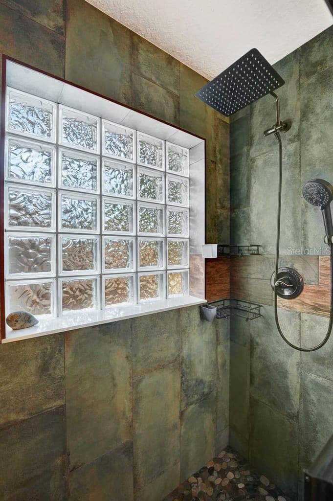 Secondary Bathroom Shower with New Tile & Stone work - 1580 DELAND AVE, ORANGE CITY